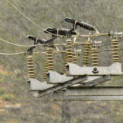 a bunch of wires that are on top of a pole